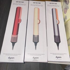 Dyson Air Strait Hair Tools in Red, Cream, and Silver